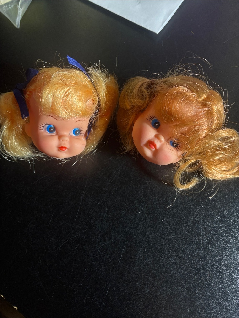 2 vintage doll heads
